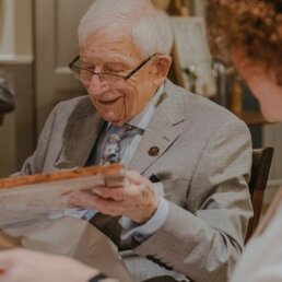 Resident at Redlands House Care Home Norwich, enjoying a party