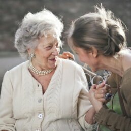 Exceptional care workers with lovely resident at Redlands House Care Home Norwich