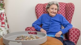 Care Home Nowrich resident enjoying a puzzle at Redlands House Care Home