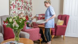 Norwich Care Home Serving tea in the sitting room at Redlands House